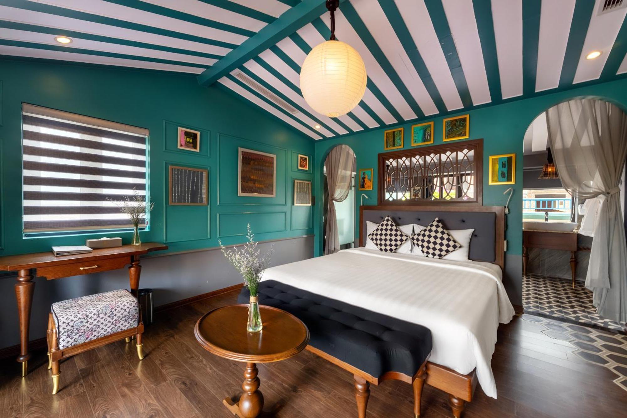 Son Hoi An Boutique Hotel & Spa 외부 사진 A bedroom at the hotel